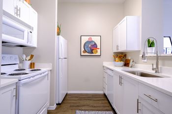 Well appointed kitchen with custom cabinetry